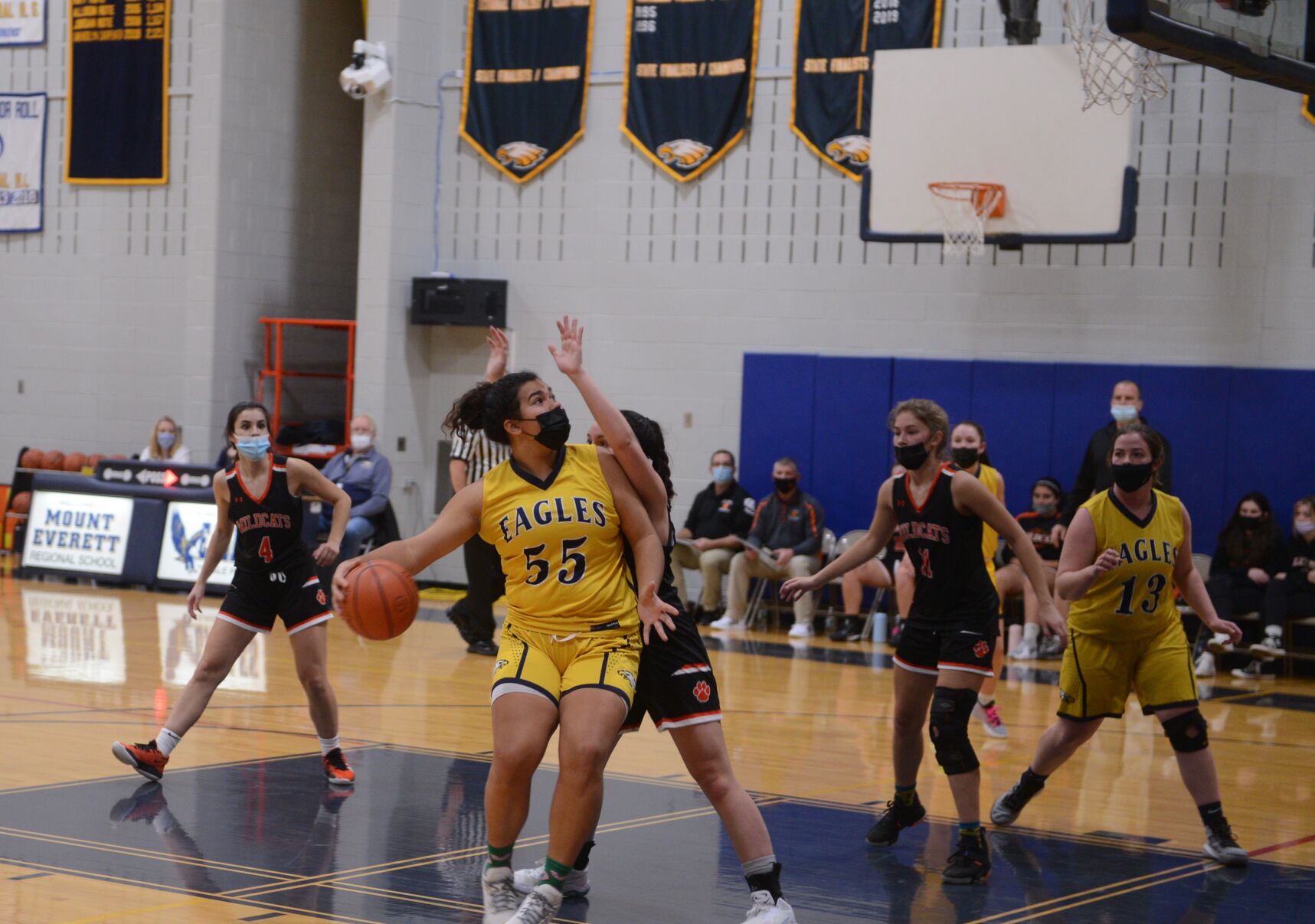 Emma Goewey looks for a way to the basket
